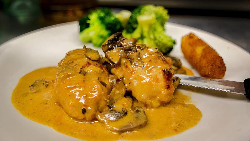 Stuffed Chicken · Stuffed with Asparagus, Mozzarella, and Prosciutto, served in a Creamy Vodka Sauce with Mushrooms