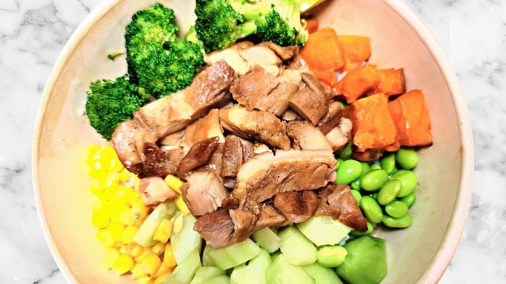 Charred Chicken Bowl · Charred chicken thigh, charred broccoli, roasted sweet potato, cucumber, edamame, corn, sesame seed with spicy mayo.