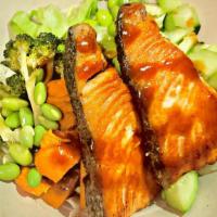 Grilled Salmon Bowl · Grilled Salmon, charred broccoli, roasted sweet potato, cucumber, edamame, corn, sesame seed...