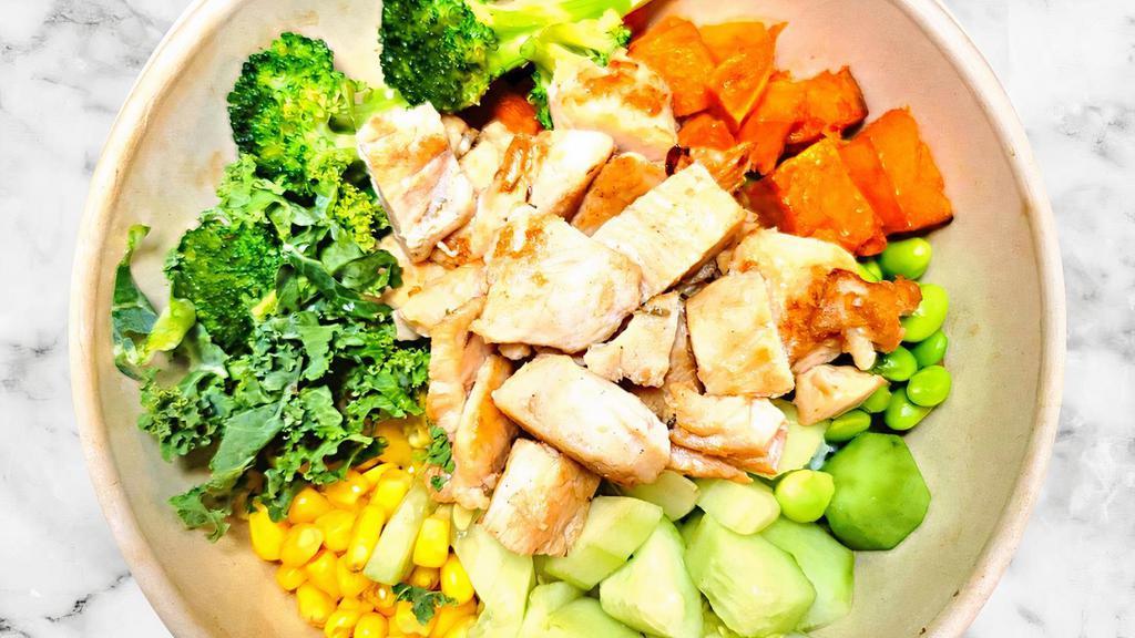 Herb Roasted Chicken Bowl · Herb roasted chicken breast, charred broccoli, cucumber, edamame, corn, kale, sesame seed with roasted garlic sauce.