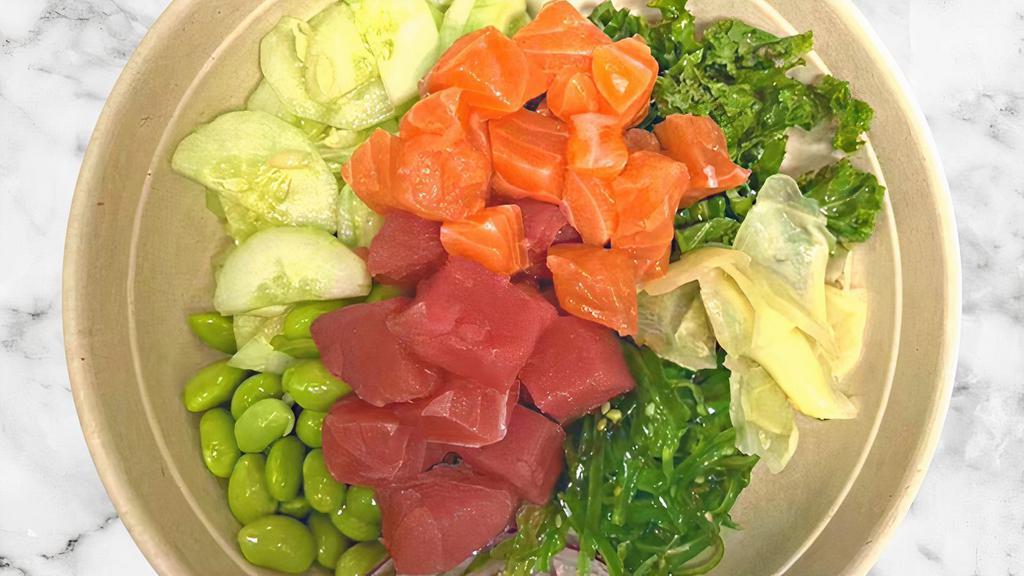 Rainbow Love Bowl · Ahi Tuna (Raw), Salmon (Raw), seaweed salad, crabmeat salad, sweet onion, cucumber, edamame, kale, corn, pickled ginger, sesame seed, crispy onion with ponzu sauce.