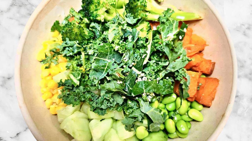 Daily Harvest Bowl · Charred broccoli, cucumber, edamame, corn, kale, tomato, roasted sweet potato, sesame seed with roasted garlic sauce.
