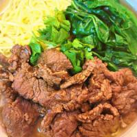 Tender Prime Beef Ramen Noodle Soup · Japanese ramen noodle  with tonkotsu soup base. Contains tender prime beef, spinach, corn, c...