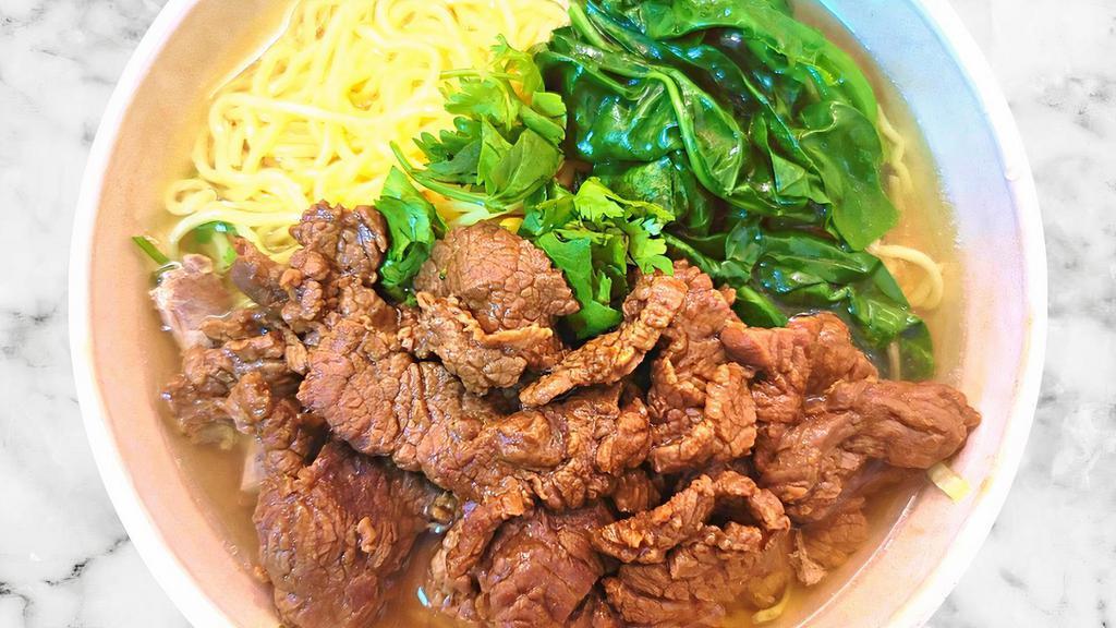 Tender Prime Beef Ramen Noodle Soup · Japanese ramen noodle  with tonkotsu soup base. Contains tender prime beef, spinach, corn, cilantro, scallions