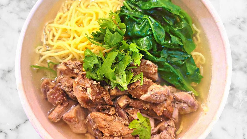 Charred Chicken Ramen Noodle Soup · Japanese ramen noodle with tonkotsu soup base. Contains charred chicken, spinach, corn, cilantro, scallions