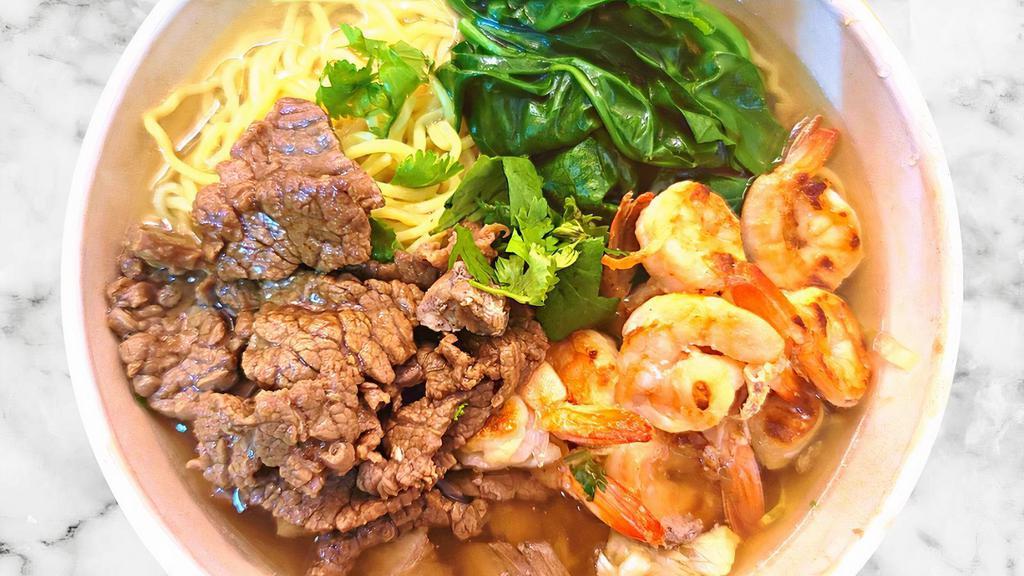 Beef And Shrimp Ramen Noodle Soup · Japanese ramen noodle with tonkotsu soup base. Contains prime beef, grilled shrimp,  spinach, corn, cilantro, scallions