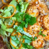 Shrimp Scallion Pancake Wrap · Our signature flaky, crispy scallion pancake filled with grilled shrimp, sautéed onions, pic...
