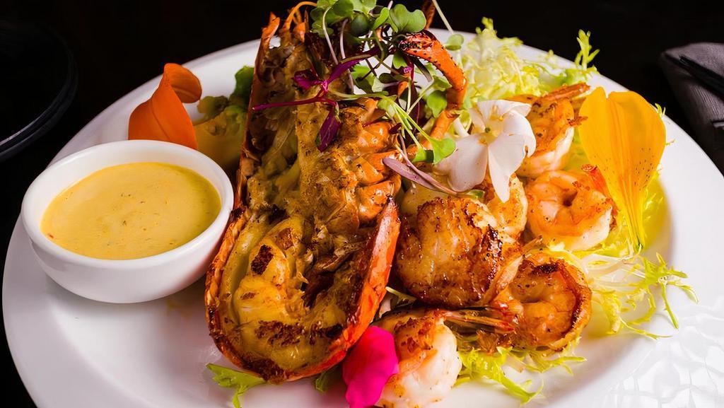 Kombu Seafood · Lobster tail, sea scallop, shrimp, saffron, kombu,lemon pickled & mayo.