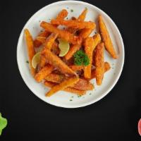 Sweet Spud Fries · Thick-cut sweet potato wedges fried until golden brown