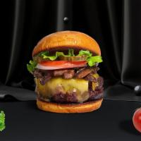 Mushroom Mania Vegan Burger · Seasoned plant-based patty topped with mushrooms, melted vegan cheese, lettuce, tomato, onio...