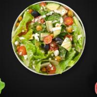 Mediterranean Grill Salad · Grilled seasonal veggies, tomatoes, cucumbers, and olives over mesclun greens served with a ...