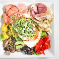 Antipasto Salad · Fresh, house-made Mozzarella, Provolone, sliced imported Italian meats, marinated artichoke ...