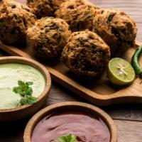 Spinach Onion Pakora · Onion, spinach & chickpeas flour fritters.