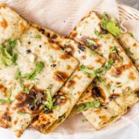 Aloo Paratha · Paratha filled with spiced potatoes.