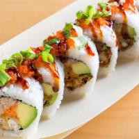 Spider Roll · Soft shell crab, crab meat, Japanese mayo, avocado, cucumber, ginger carrots, masago, scalli...