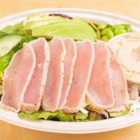 Tuna Tataki Salad · Pepper crusted seared tuna, avocado, edamame, romaine lettuce, scallions, cabbage, cucumber,...