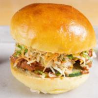 Chicken Bun · All natural chicken, teriyaki onions, teriyaki ketchup, spicy mayo; all burgers topped with:...