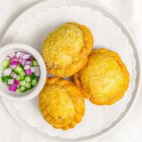 Curry Puffs · 3 PCs.
Minced chicken, potato, sweet potato, onion cooked with curry powder. Served with swe...