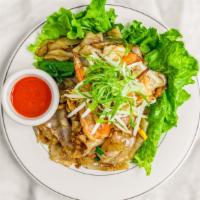 Sesame Noodle · Broad rice noodle, scallion, egg, lettuce, and sesame oil.