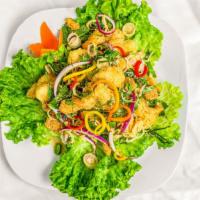Thai Catfish In Herb Salad · Fried Thai catfish, chilli powder, roasted rice grain, red onion, mint, scallion, lemongrass...