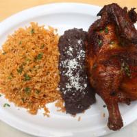 1/4 Rostisserie Chicken Platter · Served with rice and beans on the side.
