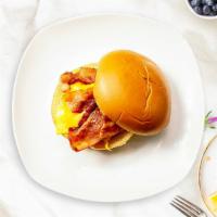 Bacon, Egg, And Cheese Sandwich · Scrambled egg, bacon, and cheddar cheese served on a bread