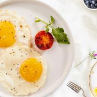Fried Eggs · Get a pair of lightly fried eggs!