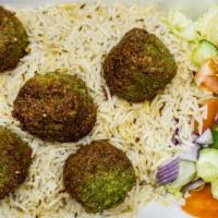 Falafel Over Rice With Soda · 