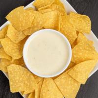 Queso Blanco · Our creamy, signature, mouth-watering cheese dip.