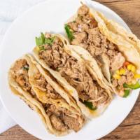 Street Tacos · Three soft corn tortillas with your choice of meat: carnitas, steak, grilled chicken, or cho...