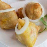 Vegetable Samosa / Chicken Samosa · Crispy pastry turnover filled with spiced minced meat or veg.