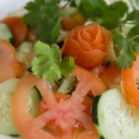 Green Salad · Indian salad of cucumber, tomatoes, onion, carrots, and lettuce.