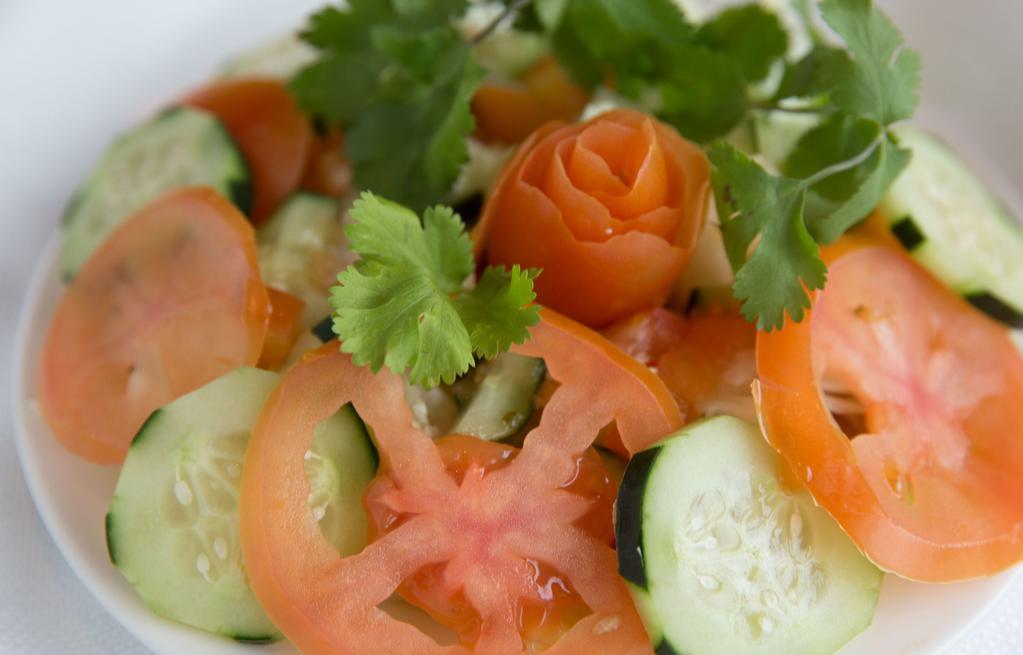 Green Salad · Indian salad of cucumber, tomatoes, onion, carrots, and lettuce.