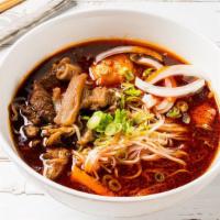 Beef Stew Pho Noodle Soup · Served with beef stew broth, with beef stew, carrots, onions, and scallions, with lemon, bas...