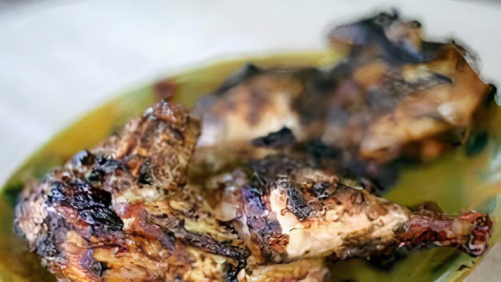 Jerk Chicken  · original jamaican jerk chicken have it your way spicy or sweet sauce and your choice of festivel or rice