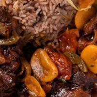 Oxtail  · jamaican style oxtal served with white rice or rice and peas