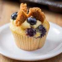 Blueberry Cheesecake · vanilla cake with blueberry cheesecake baked in, topped with graham cracker pieces,pastry cr...