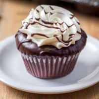 Flourless Molten Chocolate · flourless chocolate cake with a dulce de leche ganache filling, topped with french vanilla b...