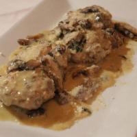 Chef Antonio'S Meatballs · Angus beef lightly fried with tomato sauce and melted mozzarella, or in a creamy mushroom sa...