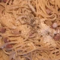 Spaghetti Carbonara · Black pepper, guanciale, fried egg, pecorino Romano cheese.