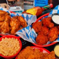 50 Pc Wings · 50 Wings of your choice (Boneless, Traditional bone in or breaded bone in) Wings with your c...