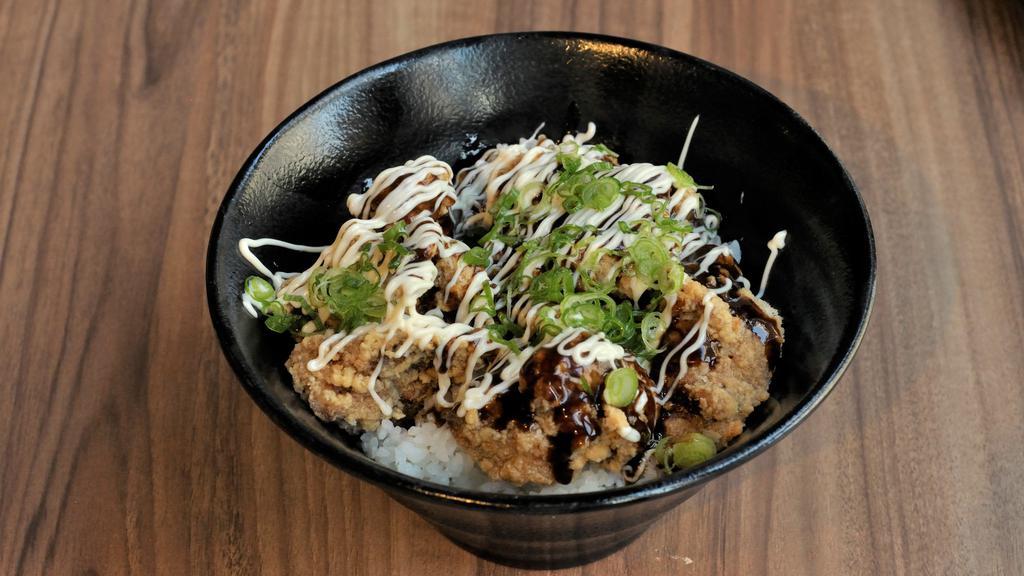 Karaage Don · Fried chicken over rice, scallions, with sweet and savory sauce