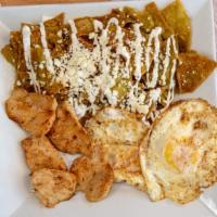 Chilaquiles · Tortillas cut in quarters with chicken or grilled beef in a red or green sauce. Top with sou...