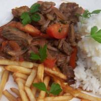 Lomo Saltado · Stir fry with white rice, french fries, choice of chicken or beef.