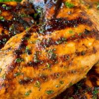 Marinated Organic Chicken Breast Side · Thyme, rosemary, lemon, garlic, olive oil.