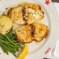 Stuffed Flounder · Broiled fillet with jumbo lump crab meat stuffing topped with lemon butter.