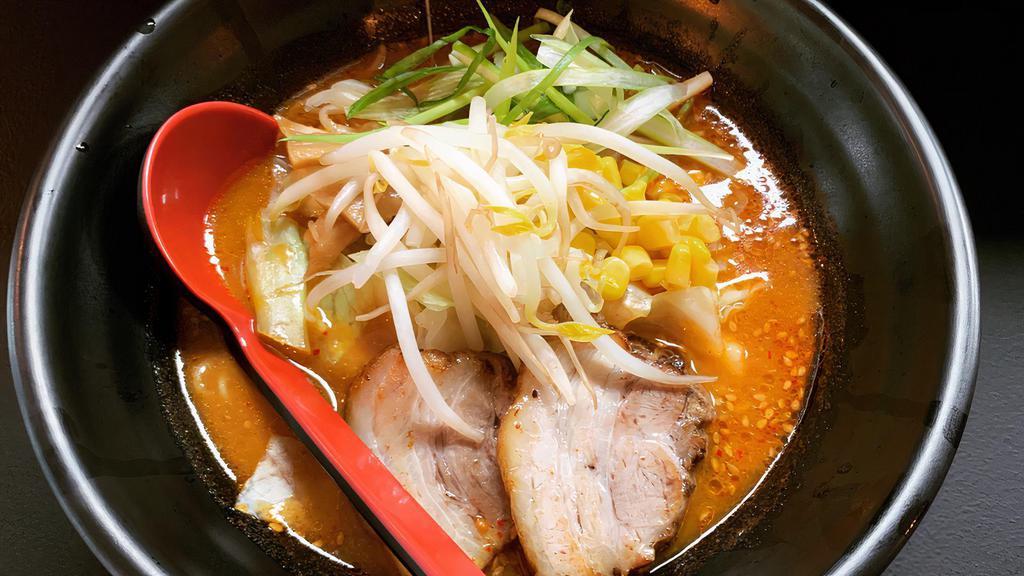 Kara Miso · Spicy soybean paste flavored chicken broth noodles. Toppings: Pork, scallion, corn, bamboo shoots, bean sprouts.