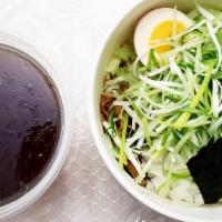 Veggie Shoyu Ramen · Soy sauce flavored veggie soup topped with bamboo shoots, cabbage, seaweed, scallion, onion,...