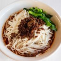 Dan Dan Mian · Noodles in a flavorful broth. Served with minced pork, cilantro, and peanut sauce.