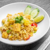 Pineapple Fried Rice · Steamed jasmine rice with egg, garlic, onion, pineapple, scallion, tomatoes, cashew nuts, cu...